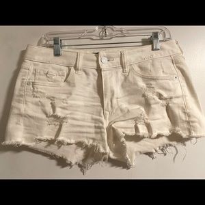 Express Low Rise white shorts.